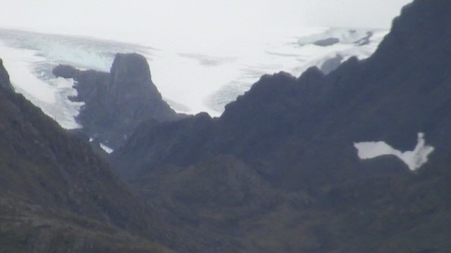 another glacier calving into the sea