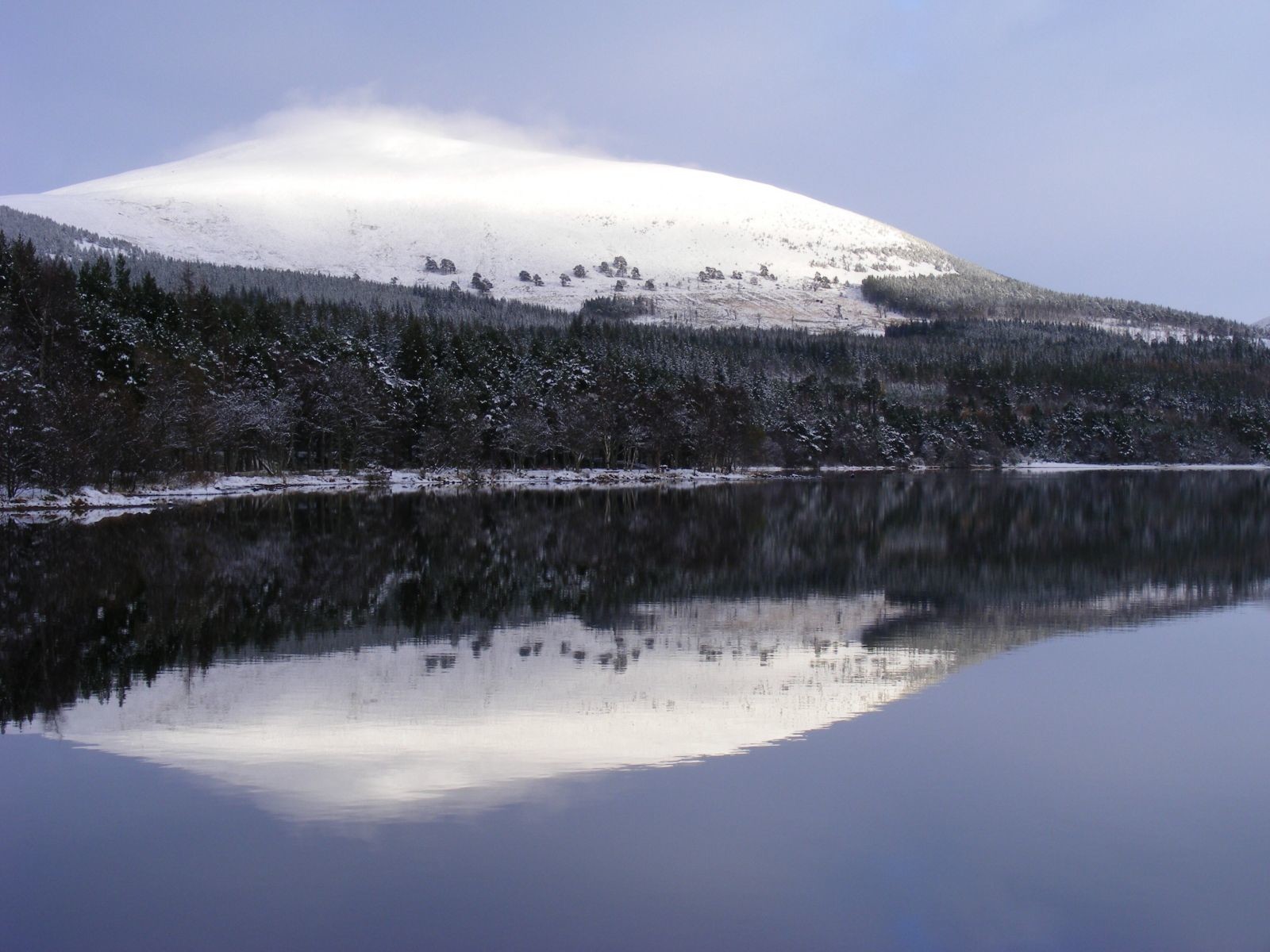 Reflection on Loch Morlich at the base of the Cairngorms