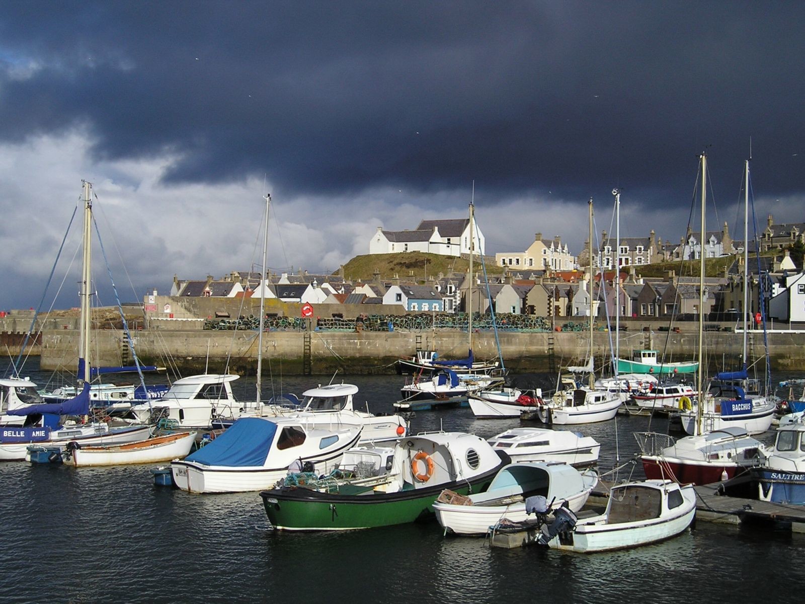 Storm clouds gather over Findochty harbour