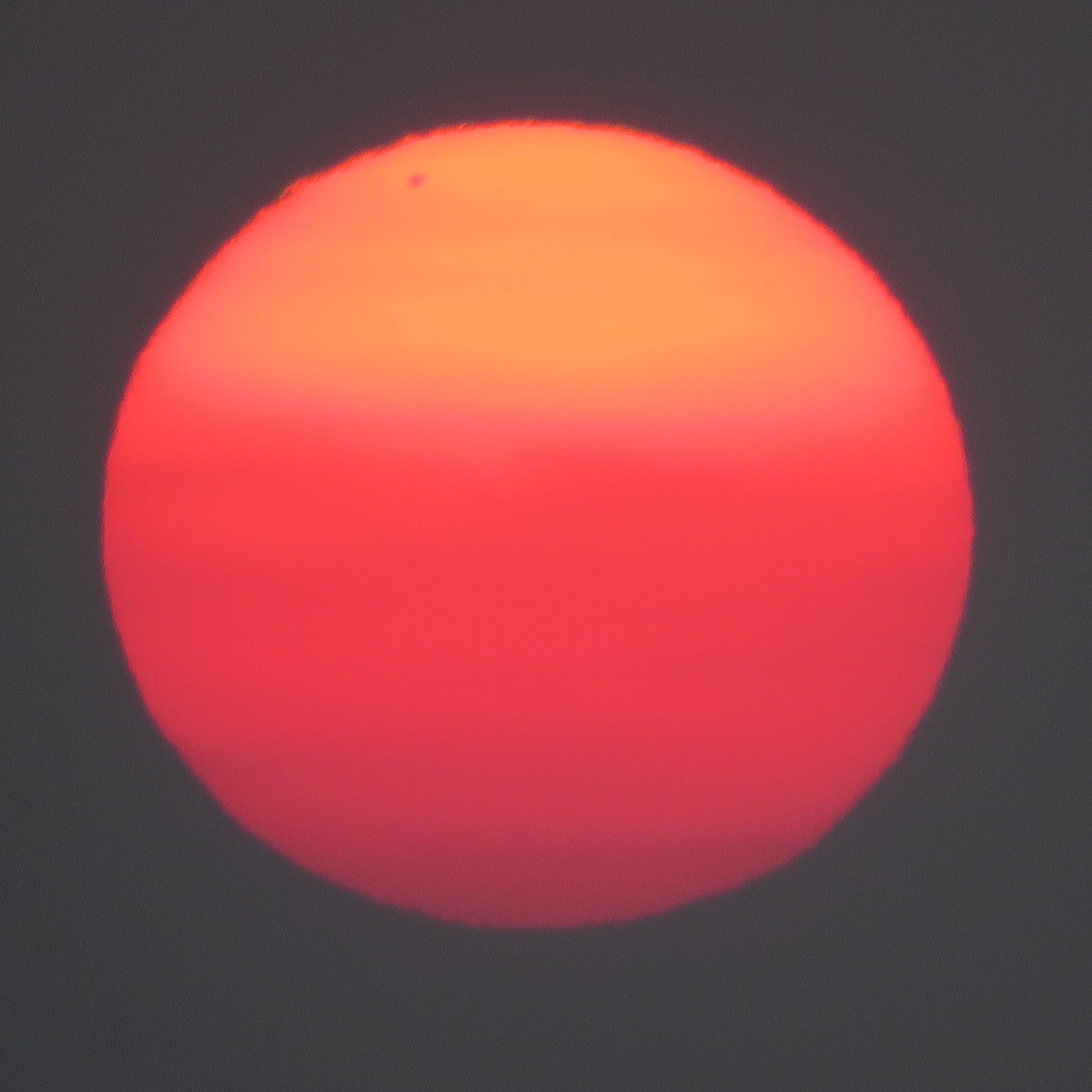 Sunset with sunspot. 8th April 2019 from Irlam, UK